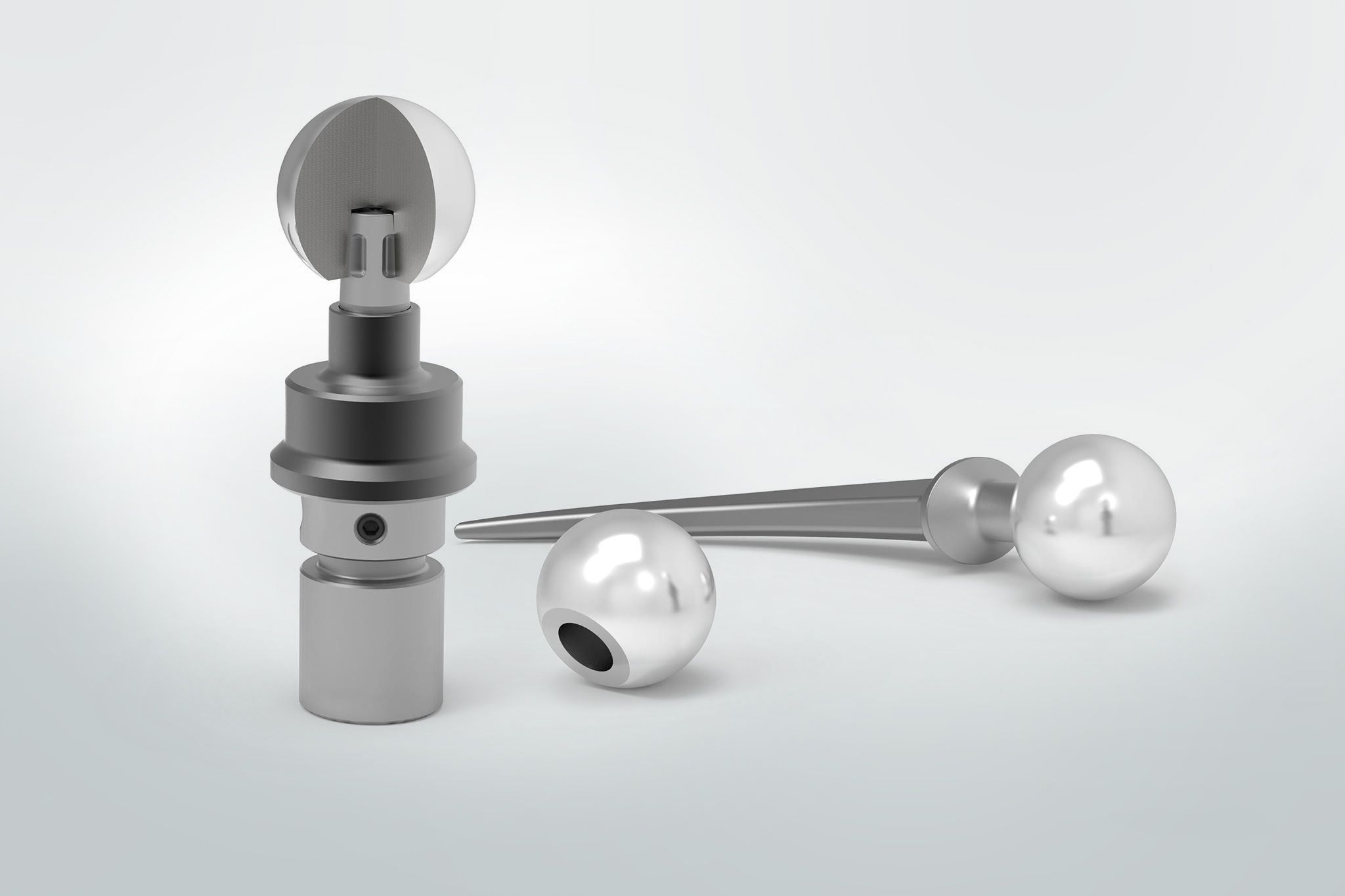 An artificial hip joint, a hip joint ball and a chuck that clamps the hip joint ball from the inside.