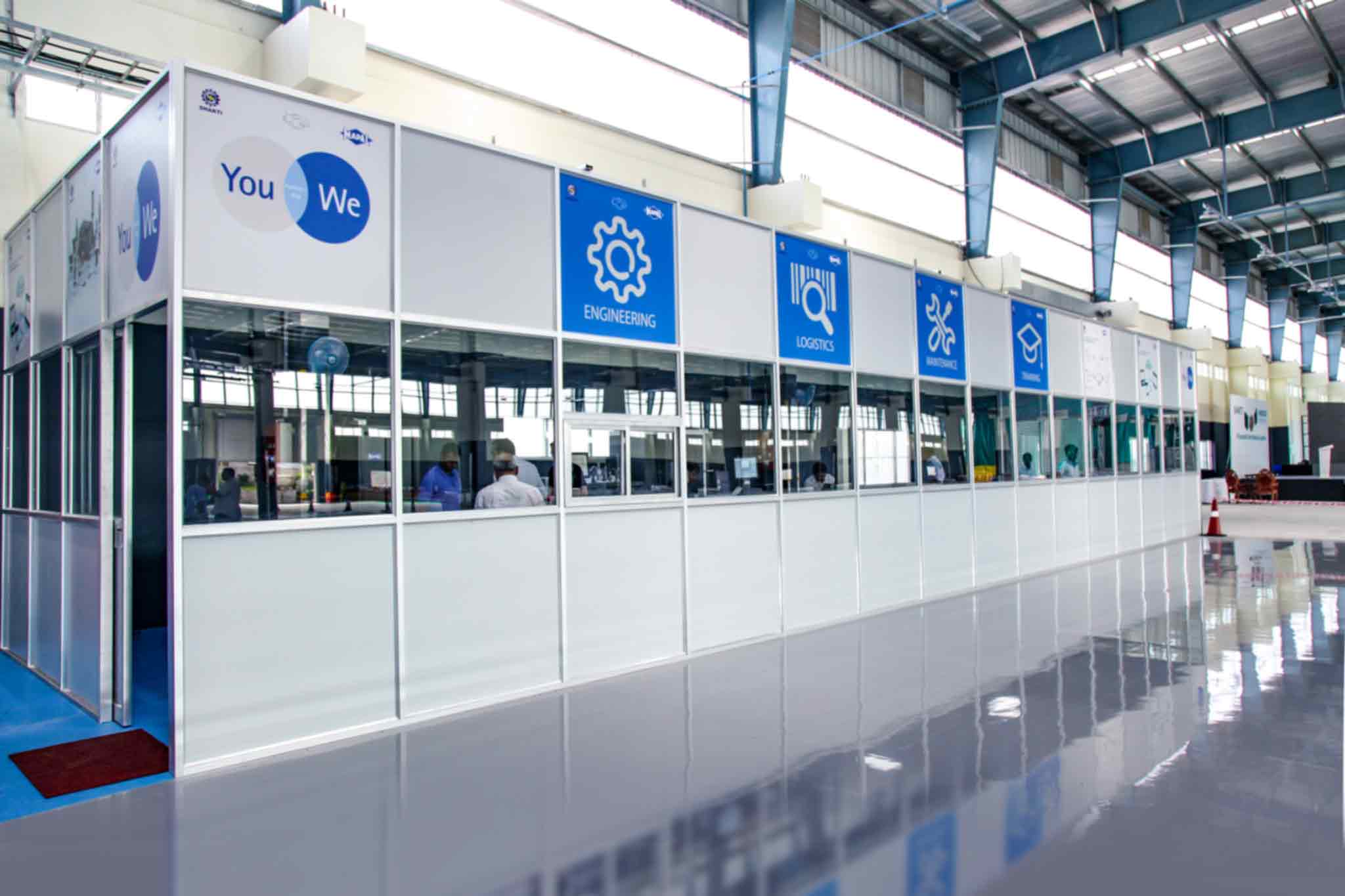 The tool-setting area can be seen from the outside. It is an elongated structure within the manufacturing area.