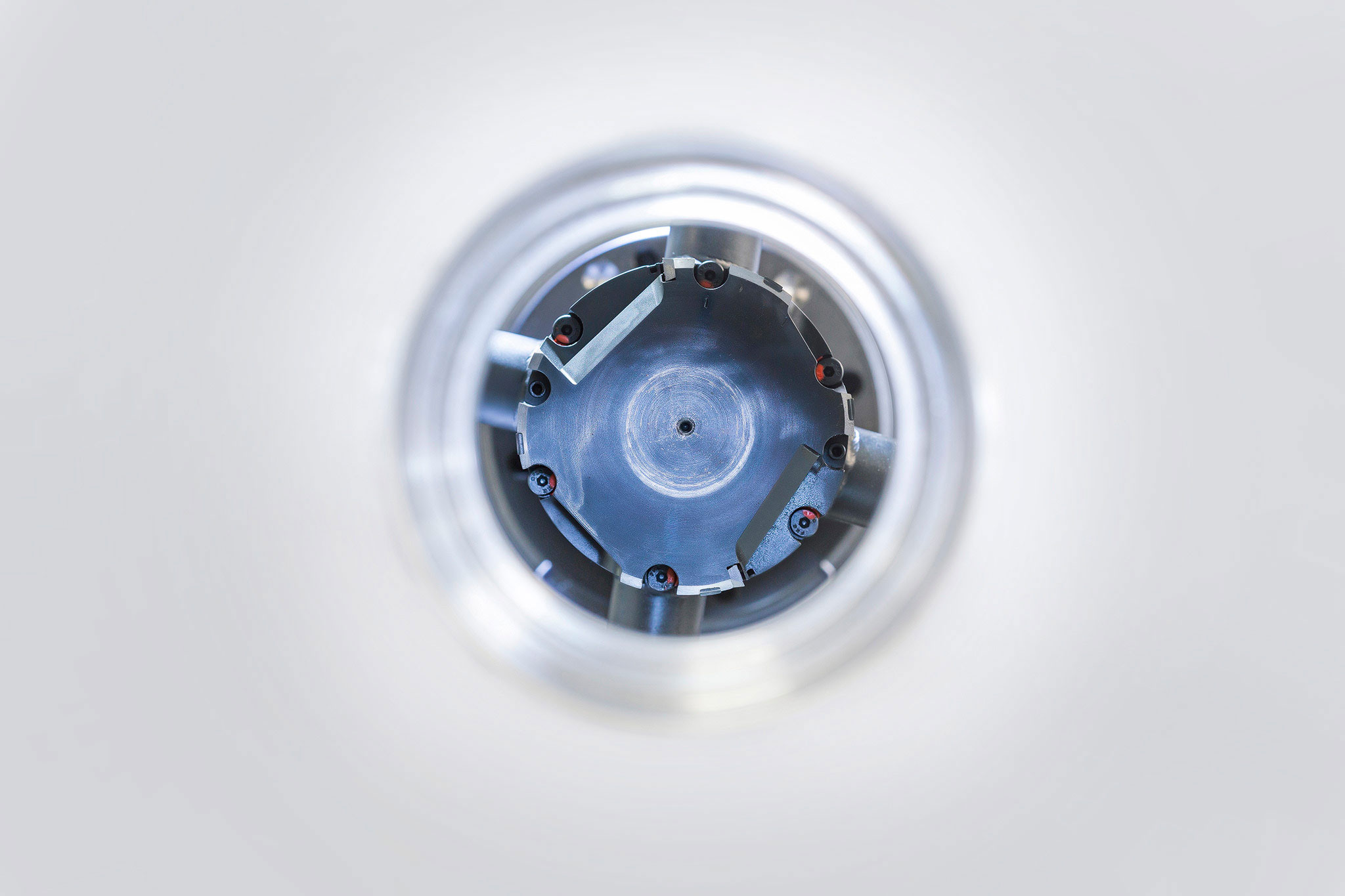 The front of the fine boring tool is shown through the bearing bore in the stator housing.