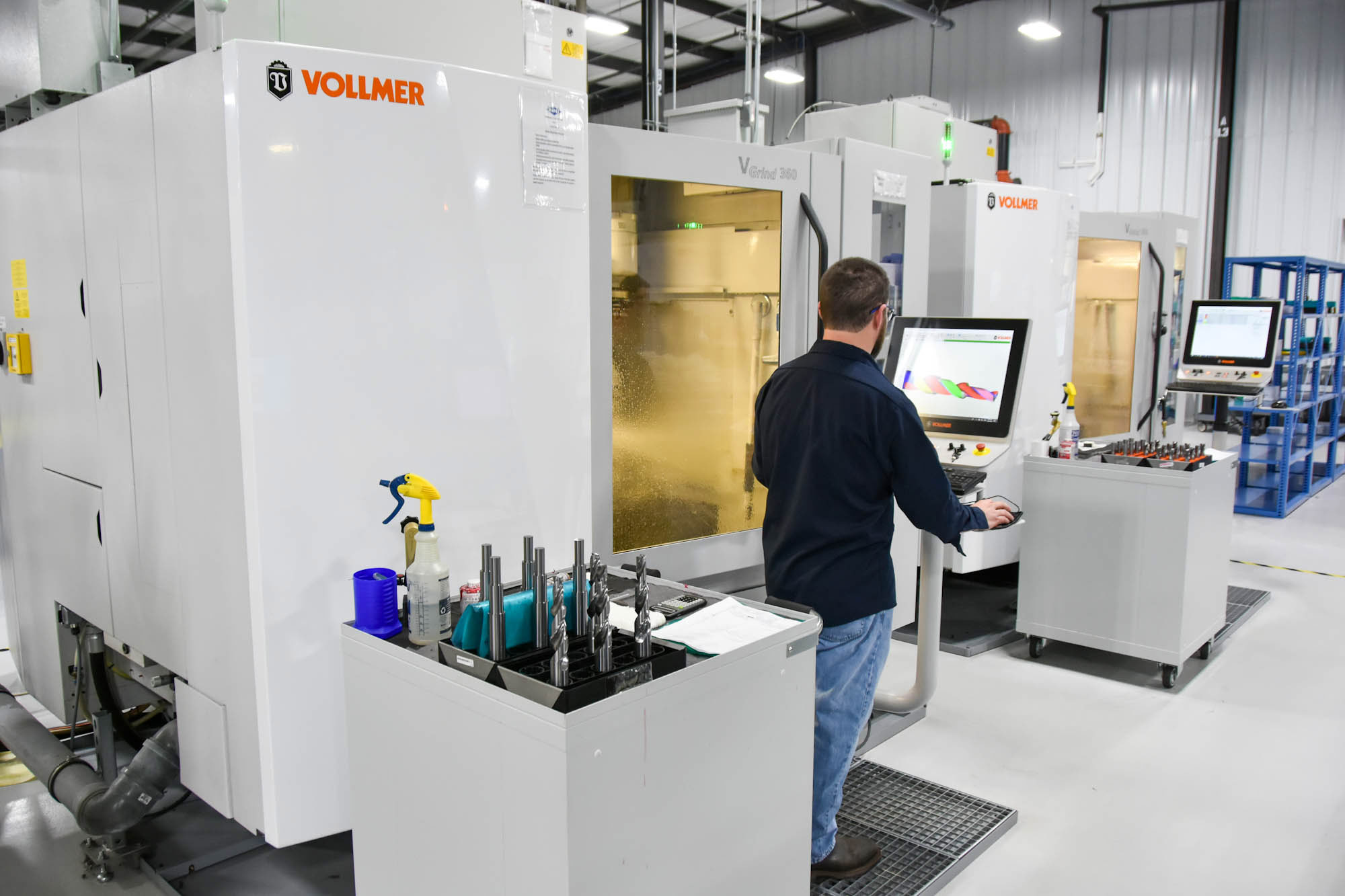A MAPAL Inc. employee operating a machine