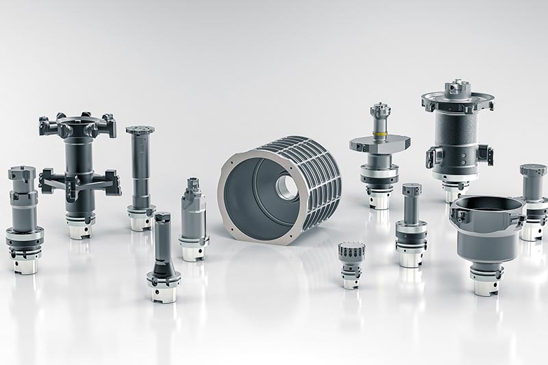 Eleven tools are arranged around a stator housing. 