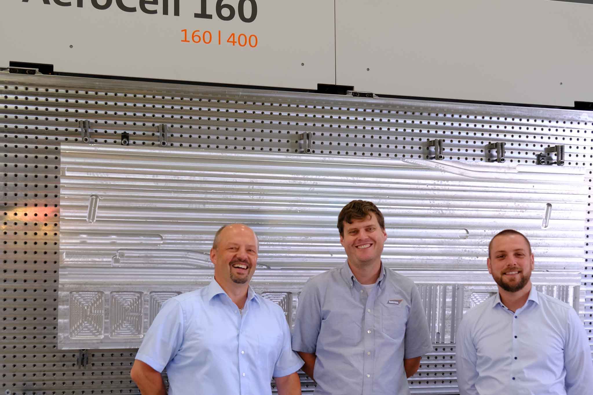 Thomas Jungbeck, Stefan Diem and Tim Rohmer stand in front of the bavius AeroCell 160.